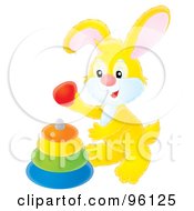 Poster, Art Print Of Cute Yellow Bunny Rabbit Playing With A Baby Ring Toy