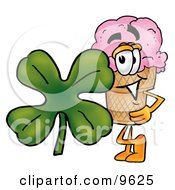 Ice Cream Cone Mascot Cartoon Character With A Green Four Leaf Clover On St Paddys Or St Patricks Day