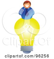 Poster, Art Print Of Happy Creative Businessman On Top Of A Yellow Light Bulb