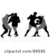 Poster, Art Print Of Silhouetted Boxers Fighting