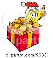 Poster, Art Print Of Light Bulb Mascot Cartoon Character Standing By A Christmas Present