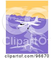 Poster, Art Print Of White Airplane Flying Over A Mountain Range