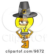 Clipart Picture Of A Light Bulb Mascot Cartoon Character Wearing A Pilgrim Hat On Thanksgiving