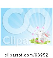 Poster, Art Print Of Gray Easter Bunny Sitting In Grass And Watching Butterflies Over A Shining Blue Background