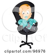 Red Haired Baby Boy In A Suit Sitting In An Office Chair