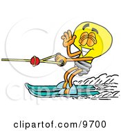 Clipart Picture Of A Light Bulb Mascot Cartoon Character Waving While Water Skiing by Mascot Junction