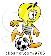 Light Bulb Mascot Cartoon Character Kicking A Soccer Ball