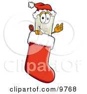 Light Switch Mascot Cartoon Character Wearing A Santa Hat Inside A Red Christmas Stocking by Mascot Junction