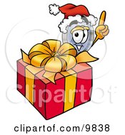 Poster, Art Print Of Magnifying Glass Mascot Cartoon Character Standing By A Christmas Present