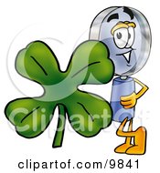 Poster, Art Print Of Magnifying Glass Mascot Cartoon Character With A Green Four Leaf Clover On St Paddys Or St Patricks Day