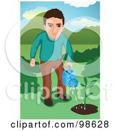 Man Watering A Small Tree