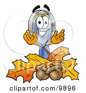 Magnifying Glass Mascot Cartoon Character With Autumn Leaves And Acorns In The Fall