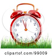 Red Alarm Clock In Green Grass