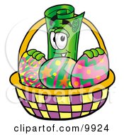 Rolled Money Mascot Cartoon Character In An Easter Basket Full Of Decorated Easter Eggs