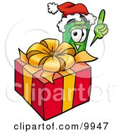 Rolled Money Mascot Cartoon Character Standing By A Christmas Present