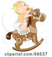 Baby Boy Sucking On A Pacifier And Riding A Rocking Horse
