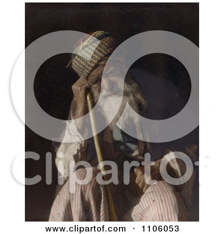 Tired Senior Arab Man Sitting And Leaning Against His Cane, Yemen - Royalty Free Historical Stock Photo by JVPD